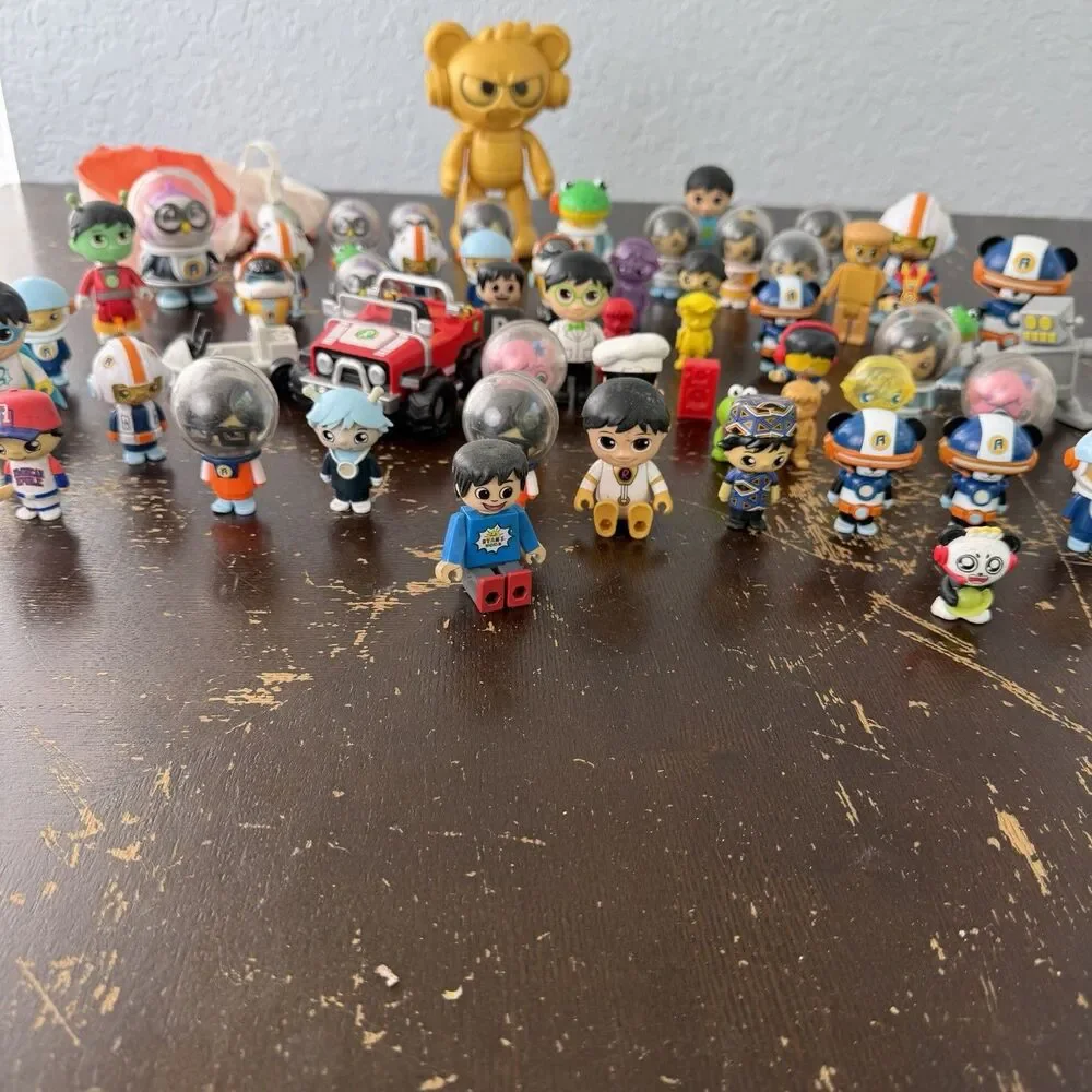 Ryan’s World Figures Lot 58 Pieces Red Titan Pandas Robots Helmet Astronauts